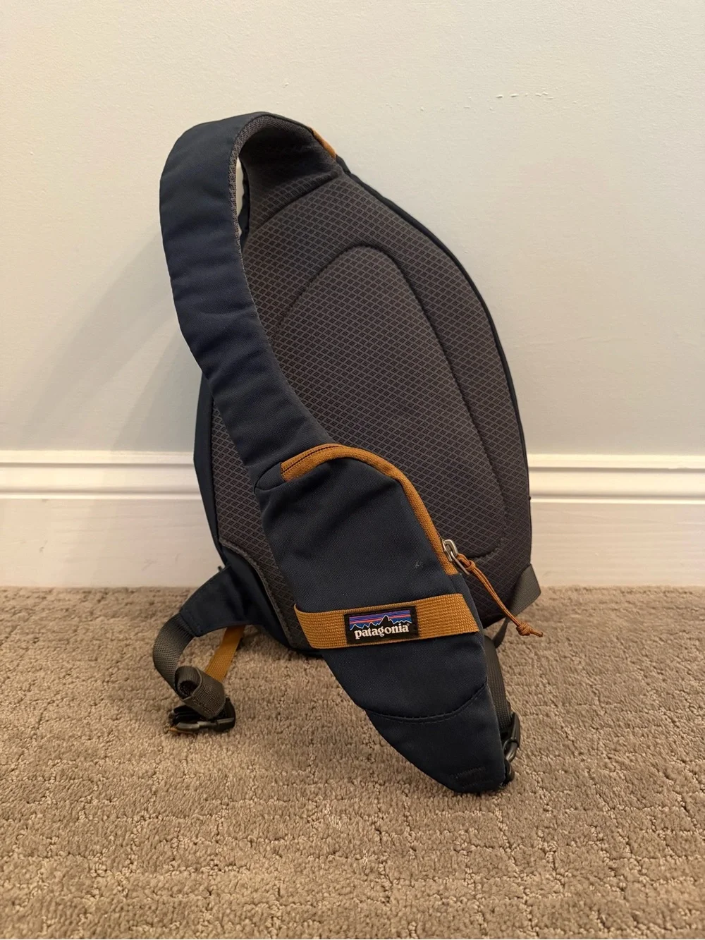 Patagonia Navy Blue Sling Backpack with Tan Accents